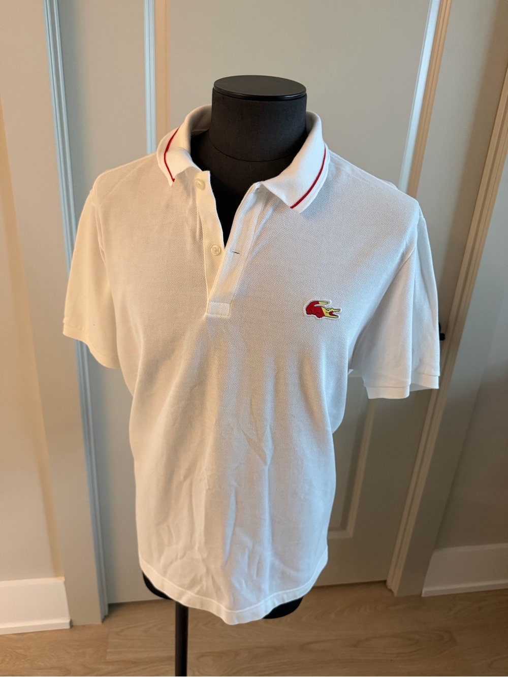 Lacoste White Polo with Red Trim and Embroidered Logo